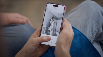 Mobile screen with image of woman in hospital