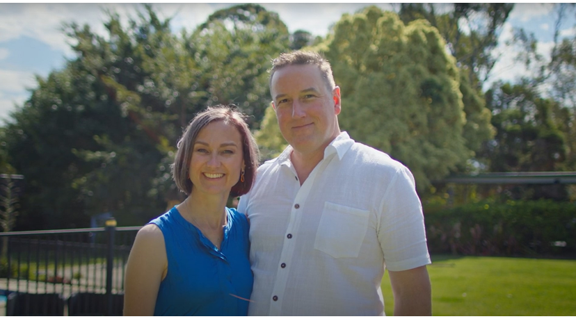 Man and woman smiling to the camera