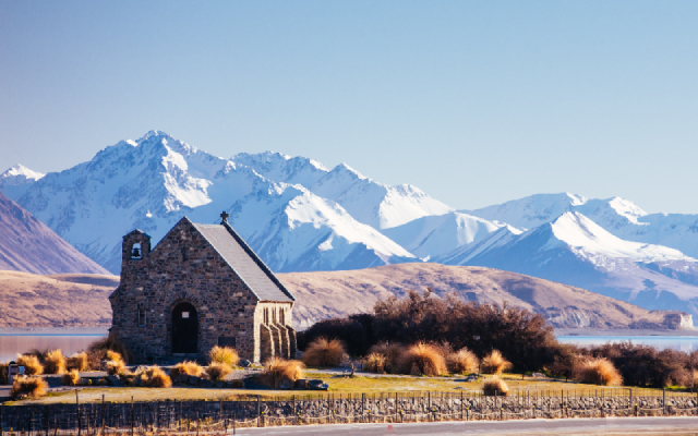 Tekapo New Zealand church with snowy mountains in the background 