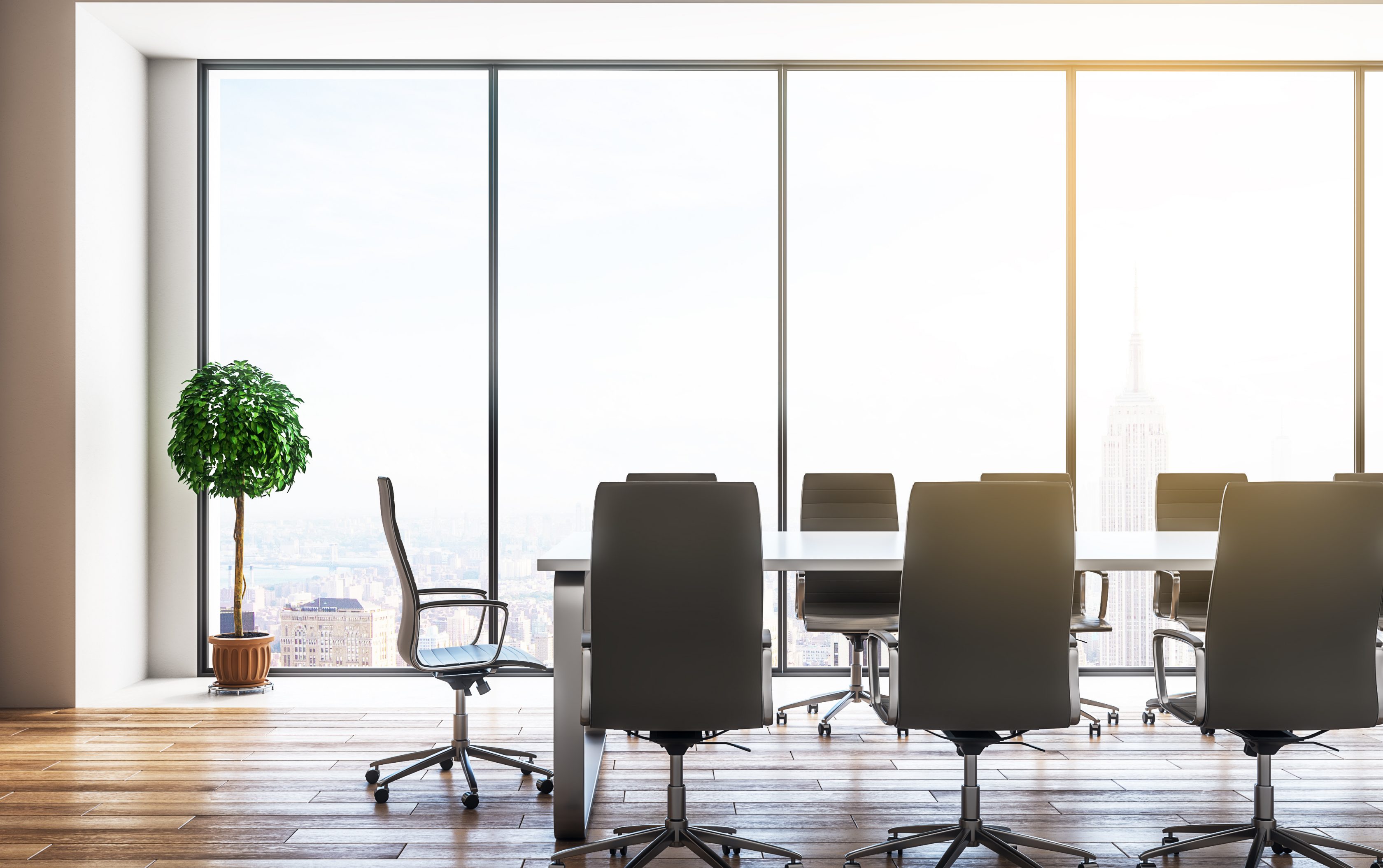 A boardroom with the Empire State building in the background